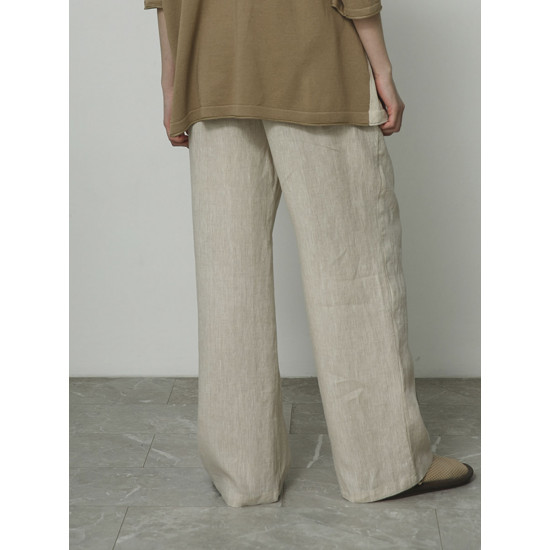 Льняные брюки с пуговицами обманками